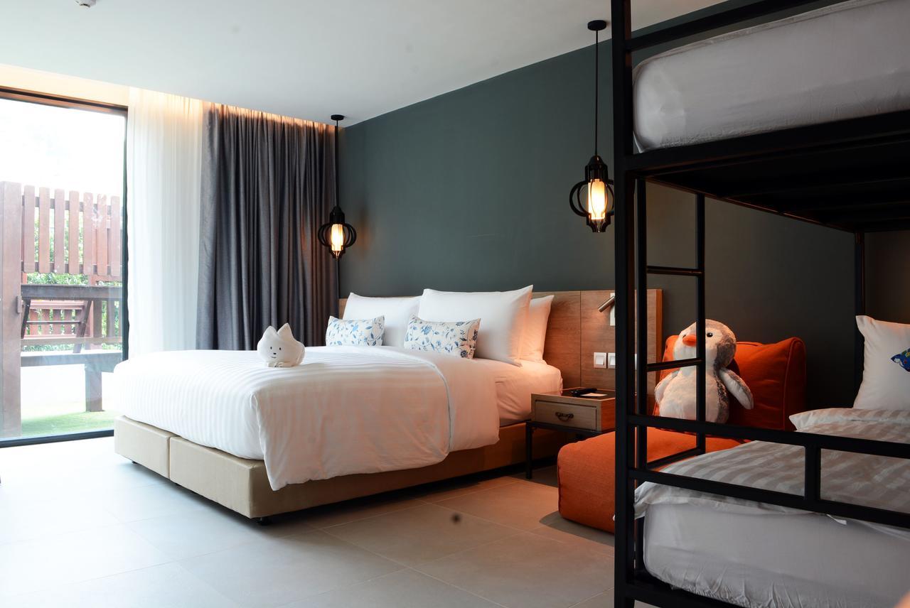 Fusion Suites Phuket Patong Exterior foto Family room at The Base