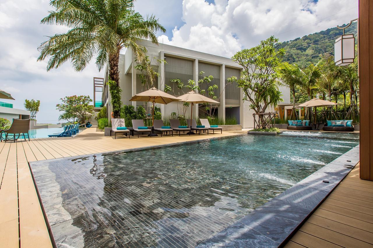 Fusion Suites Phuket Patong Exterior foto The swimming pool at the hotel