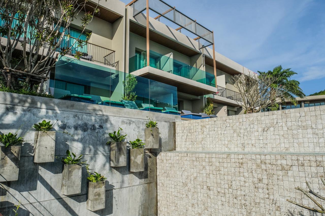 Fusion Suites Phuket Patong Exterior foto The hotel's pool