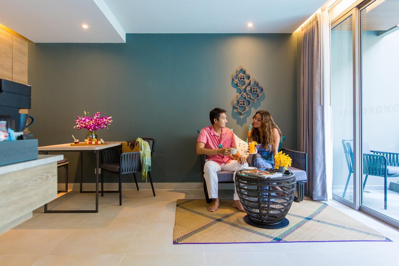 Fusion Suites Phuket Patong Exterior foto A living room at the hotel